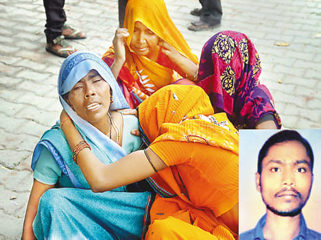 Tractor overturns death of young man