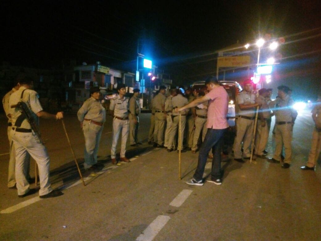 police lathi charge to open road.