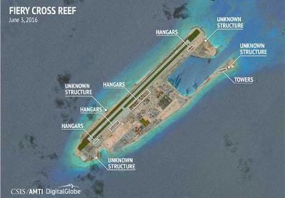 New photos cast doubt on China's vow not to militarize disputed islands
