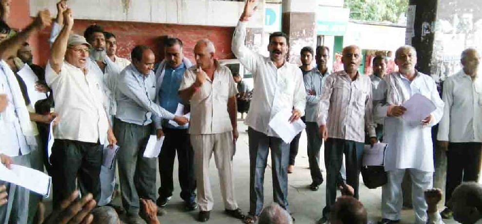 bus depot employees protest on road against mv act