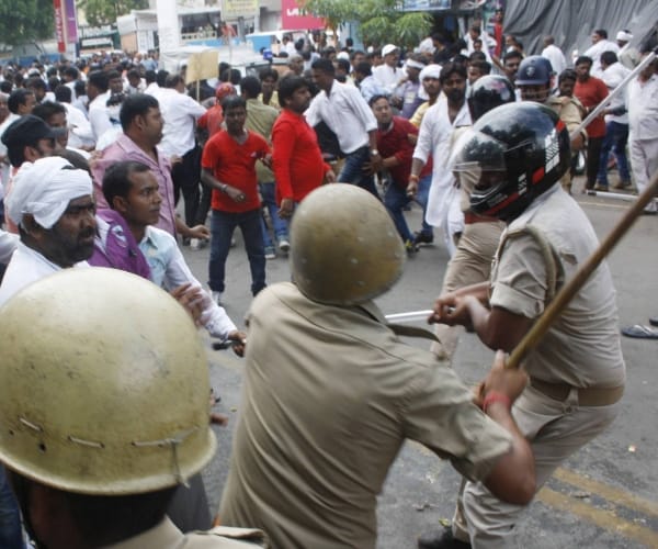 lathicharge and stone pelting in Lucknow.