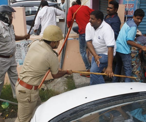 lathicharge and stone pelting in Lucknow.
