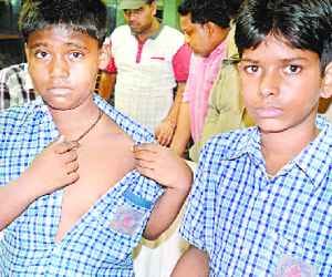 Brutally beat two children in school