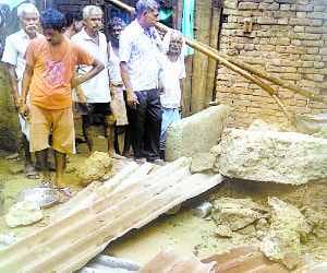 Wall collapsed, killing aged lady