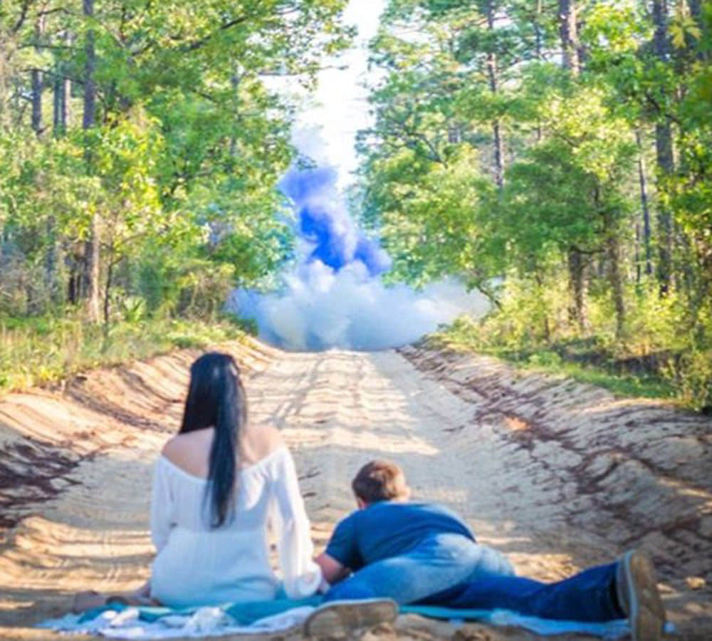 coule known baby gender reveals with explosive and rifle