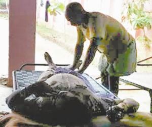Father of rape accused sub-inspector pressing his foot