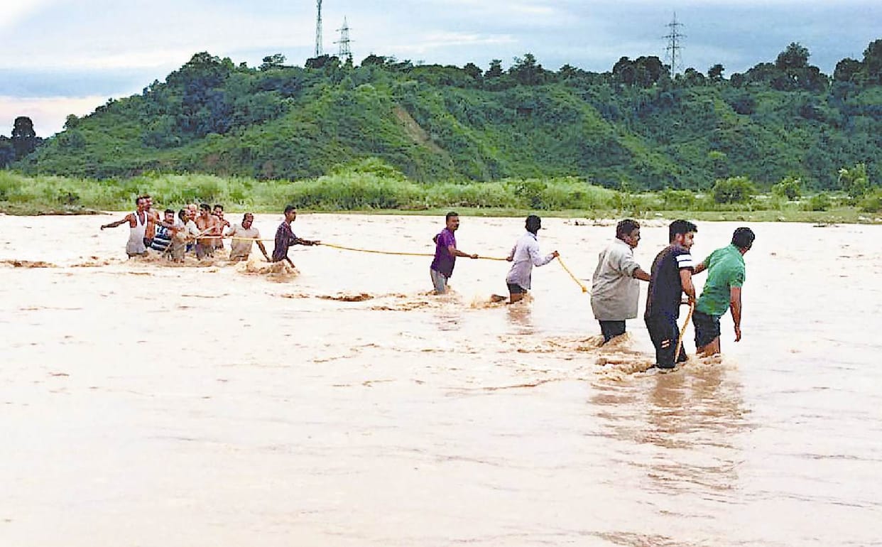 Man stuck in flooded Gaj Khad River rescued Kangra Himachal Pradesh