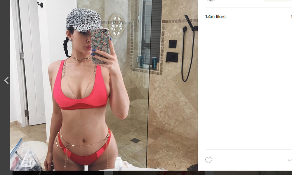 Kylie Jenner treats Tyga to PDA on the beach