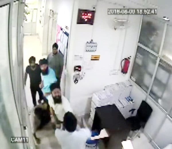 family brutally beated security guard due to touch girl, marpeet captured in cctv