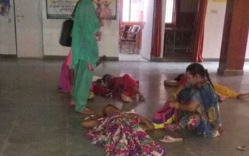 women dumped on floor after sterilization operation