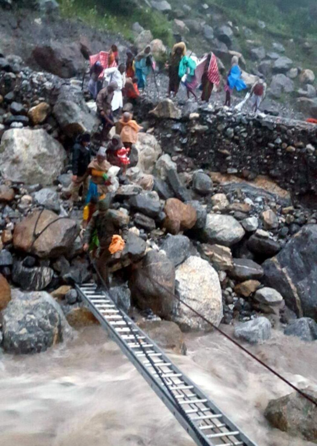 two death from heavy rain, one swept away.