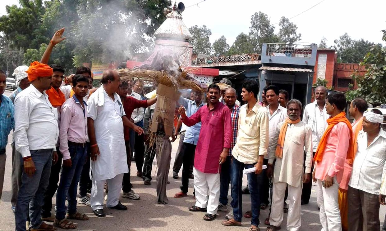 Conflict with reception, burnt the effigy of Sanjay