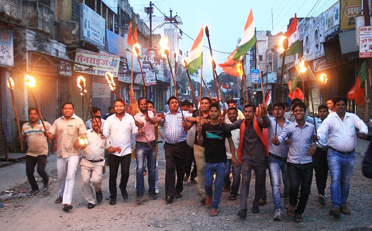 BJP workers took out a torch procession