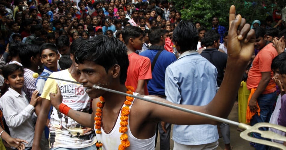 madrasi festival, madrasi festival tradition, cheek piercing on madrasi festival, superstition