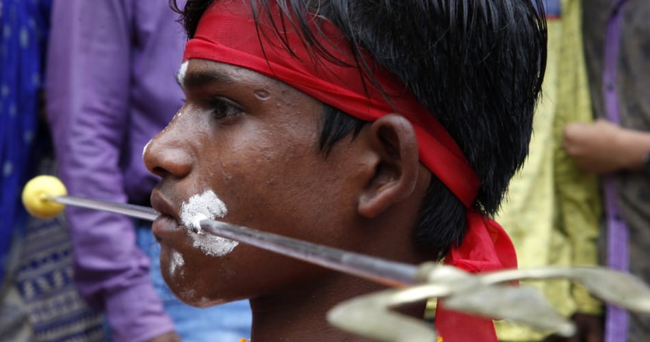 madrasi festival, madrasi festival tradition, cheek piercing on madrasi festival, superstition
