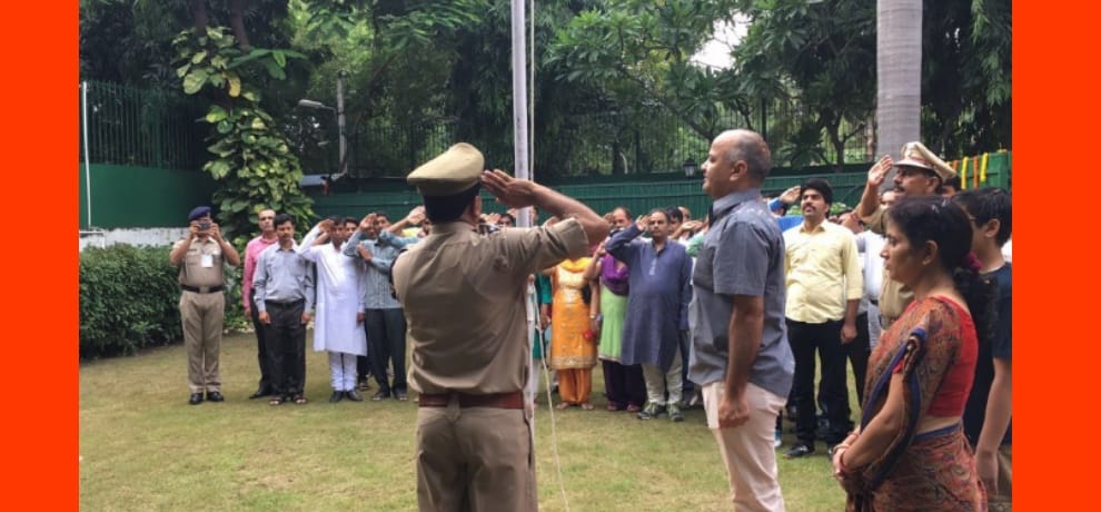 Delhi cm and deputy cm hosting flag with family