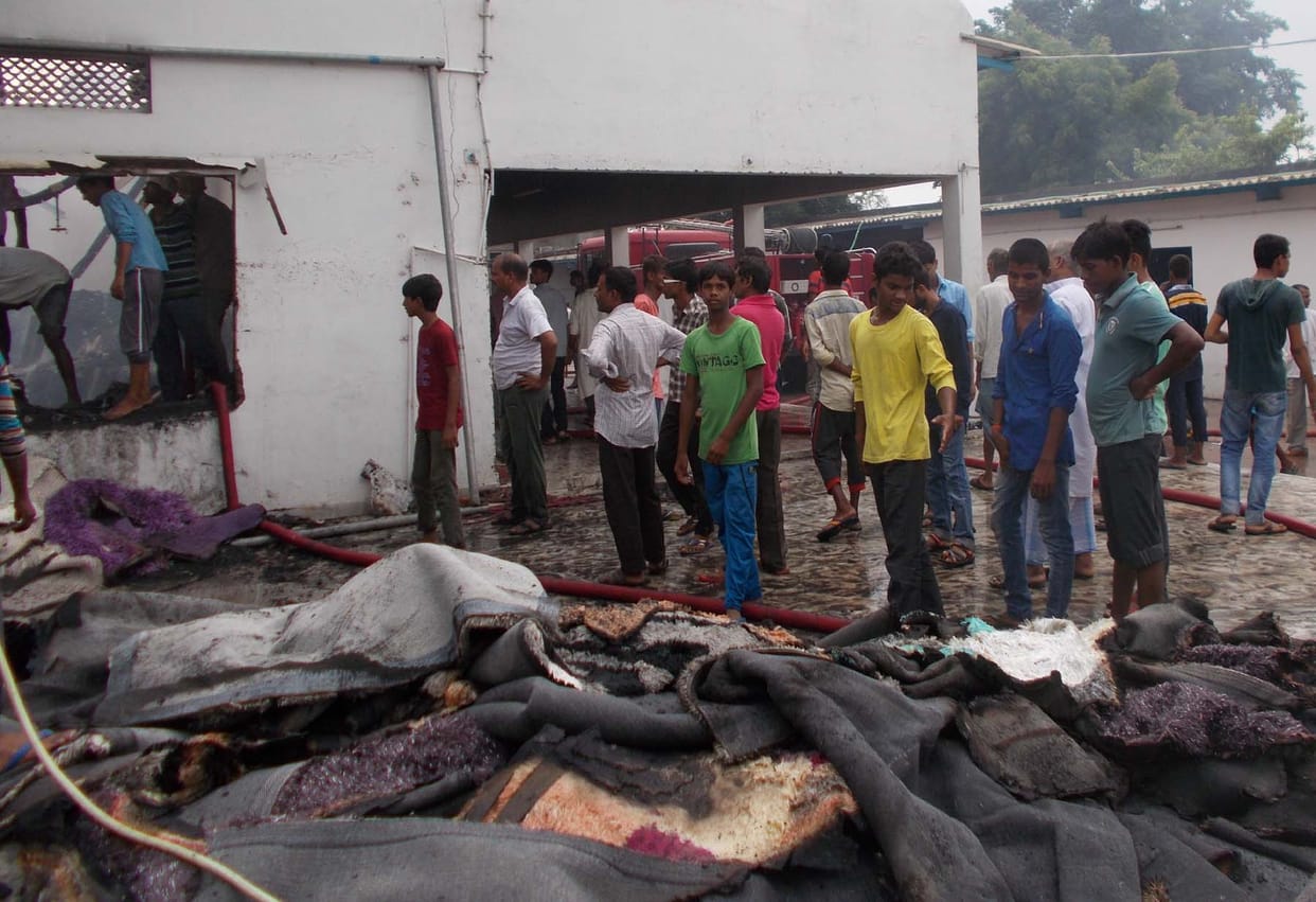 fired in carpet godwon, massive loss