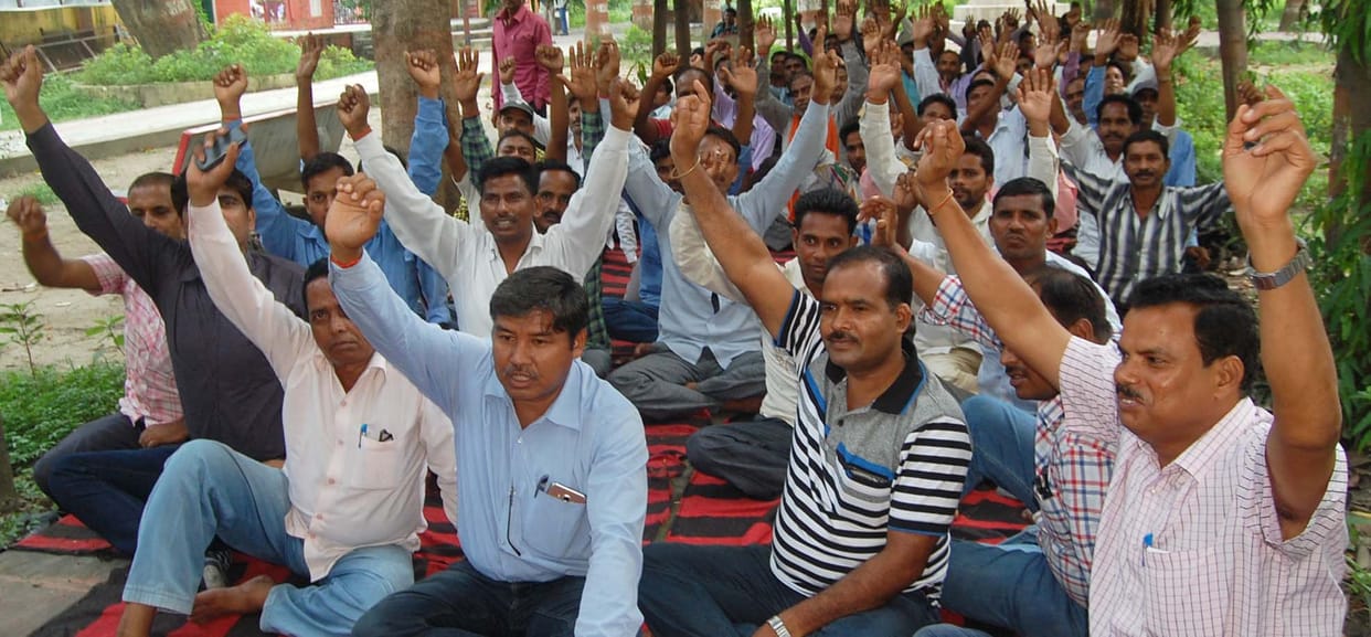 Panchayat workers picketing Lit by giving copies of mandate