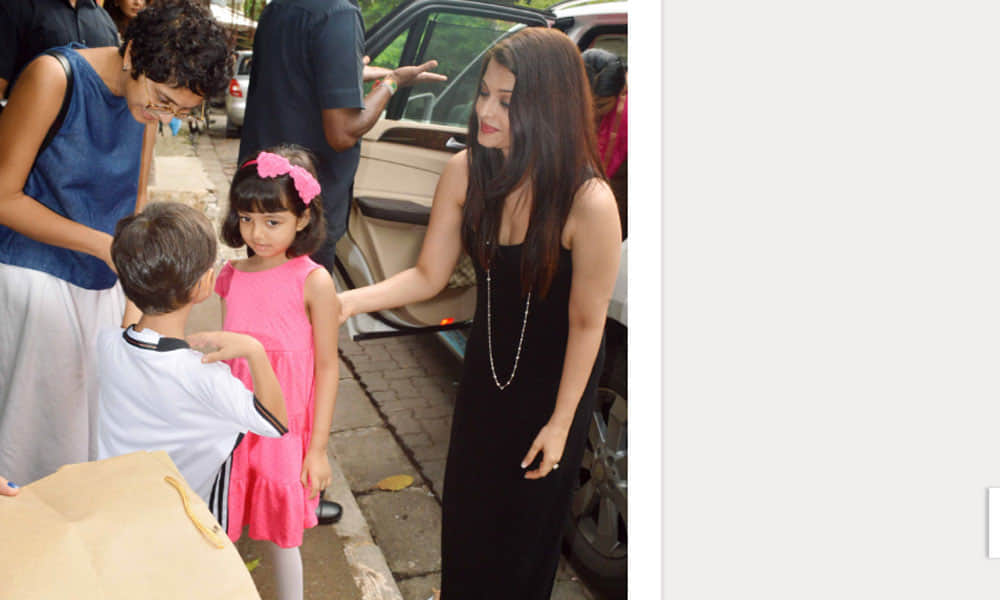 Azad Rao Khan greets Aaradhya Bachchan with a hug