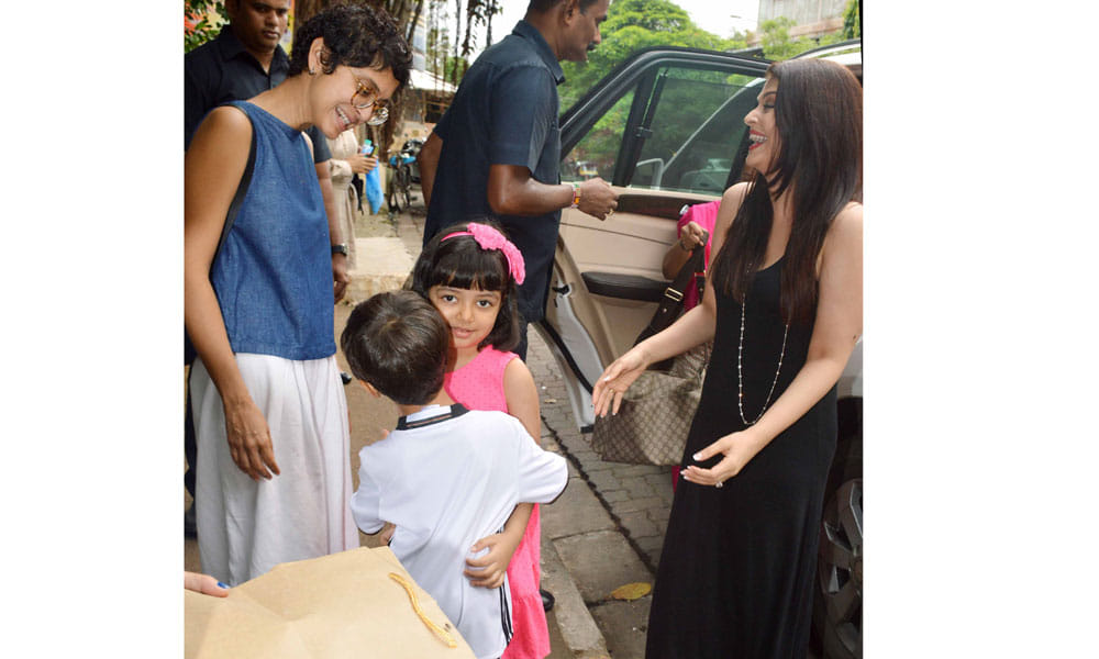 Azad Rao Khan greets Aaradhya Bachchan with a hug