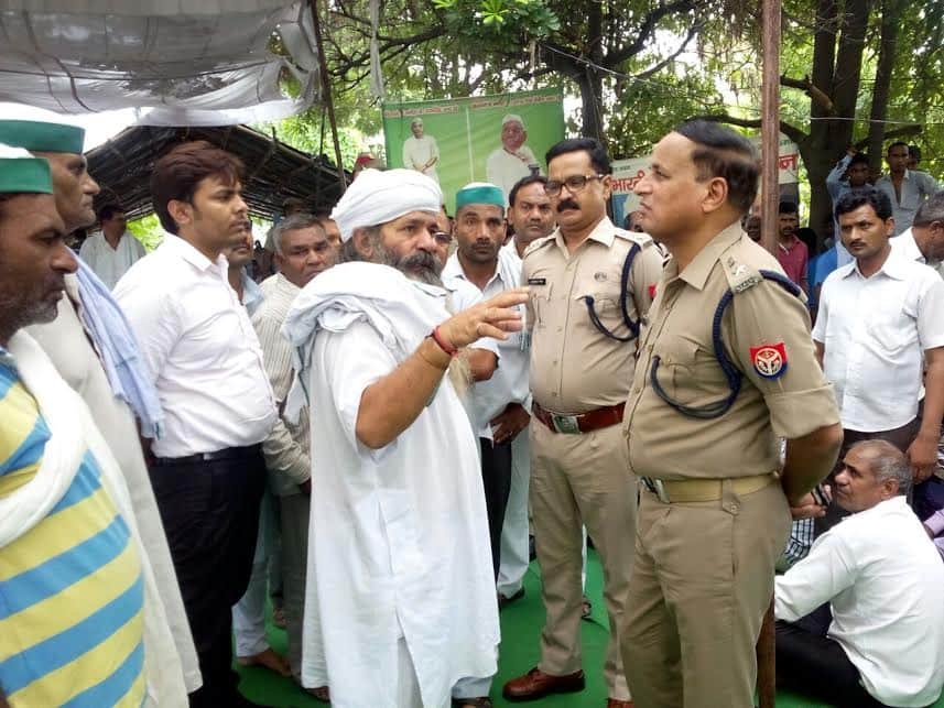 farmer climb on Water tank during protest