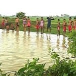 Aspiring Swimmers Preparing In A Dam For 2020 Olympics