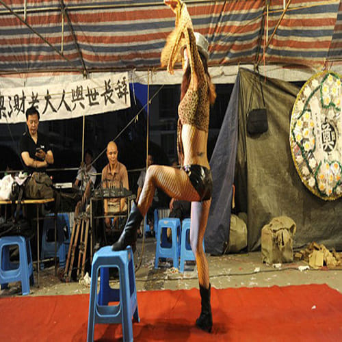 STRIPPERS for funeral in bizarre Chinese trend