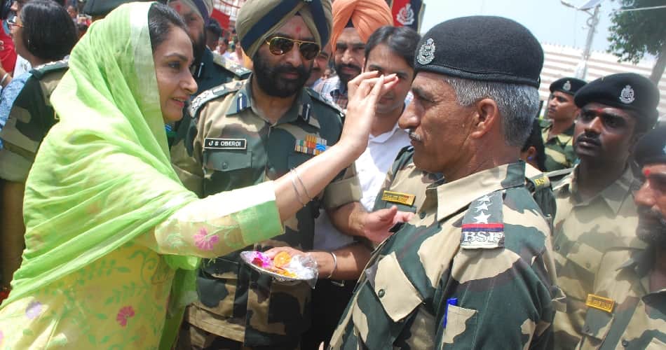 Union Minister Harsimrat Kaur Badal Ties Rakhis On BSF Troopers