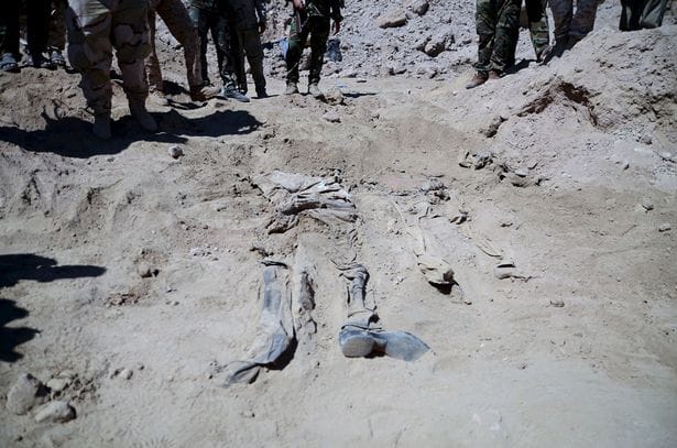 Iraq to hang 36 ISIS fighters over massacre of 1,700 soulders