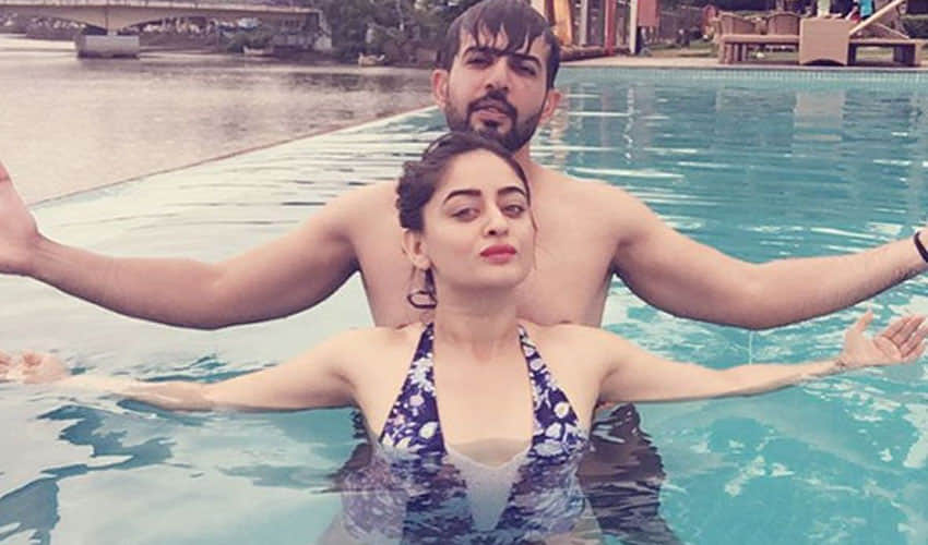 mahi and jai close in swimming pool in goa