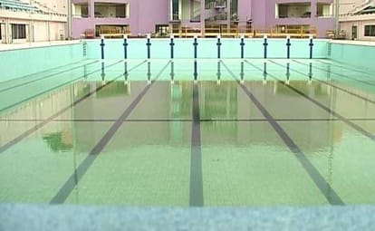 Aspiring Swimmers Preparing In A Dam For 2020 Olympics