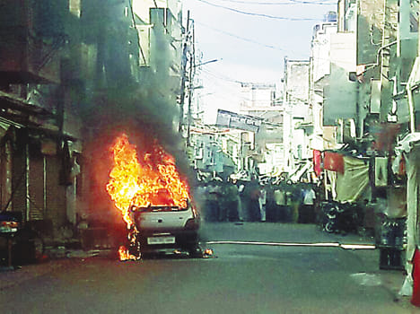 Car fire in stampede