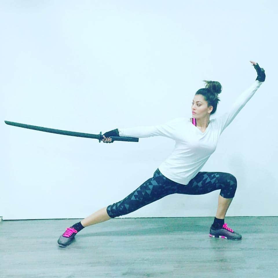 bollywood actress urvashi rautela in sword fighter look.