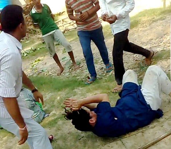 lady brutally beated with iron road in hoshiarpur, panchayat captured video and viral it