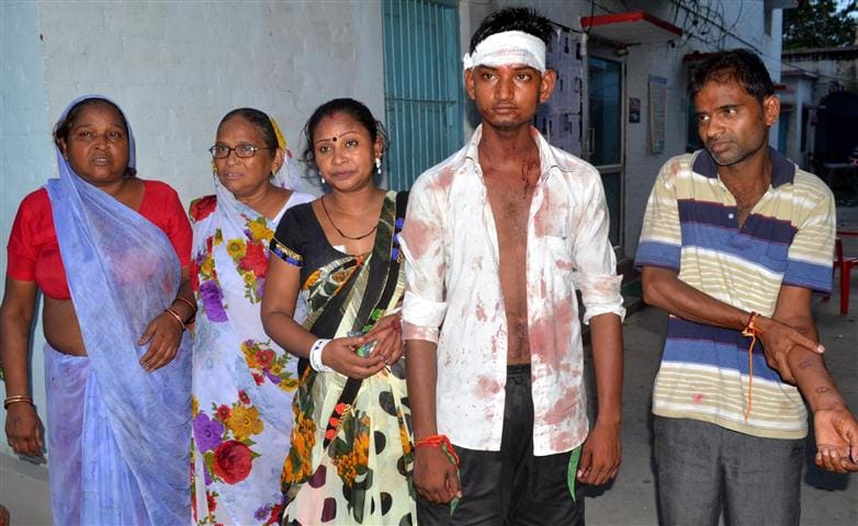 Prevented from gaming the two communities clashed , throwing stones