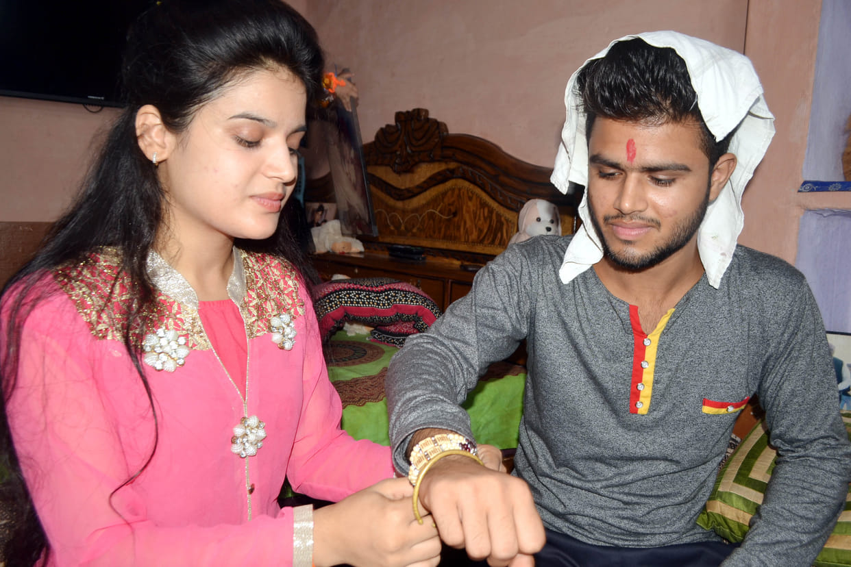 Tied rakhi brothers, wished long life