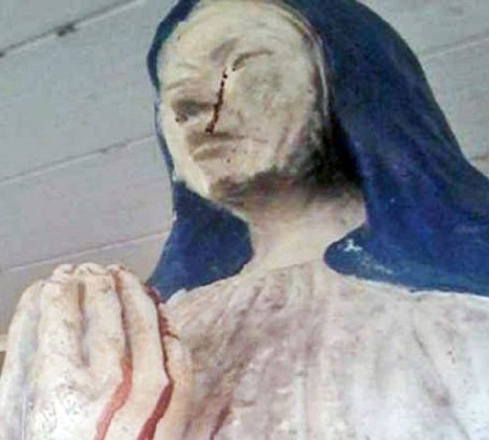 Virgin Mary statue starts crying blood