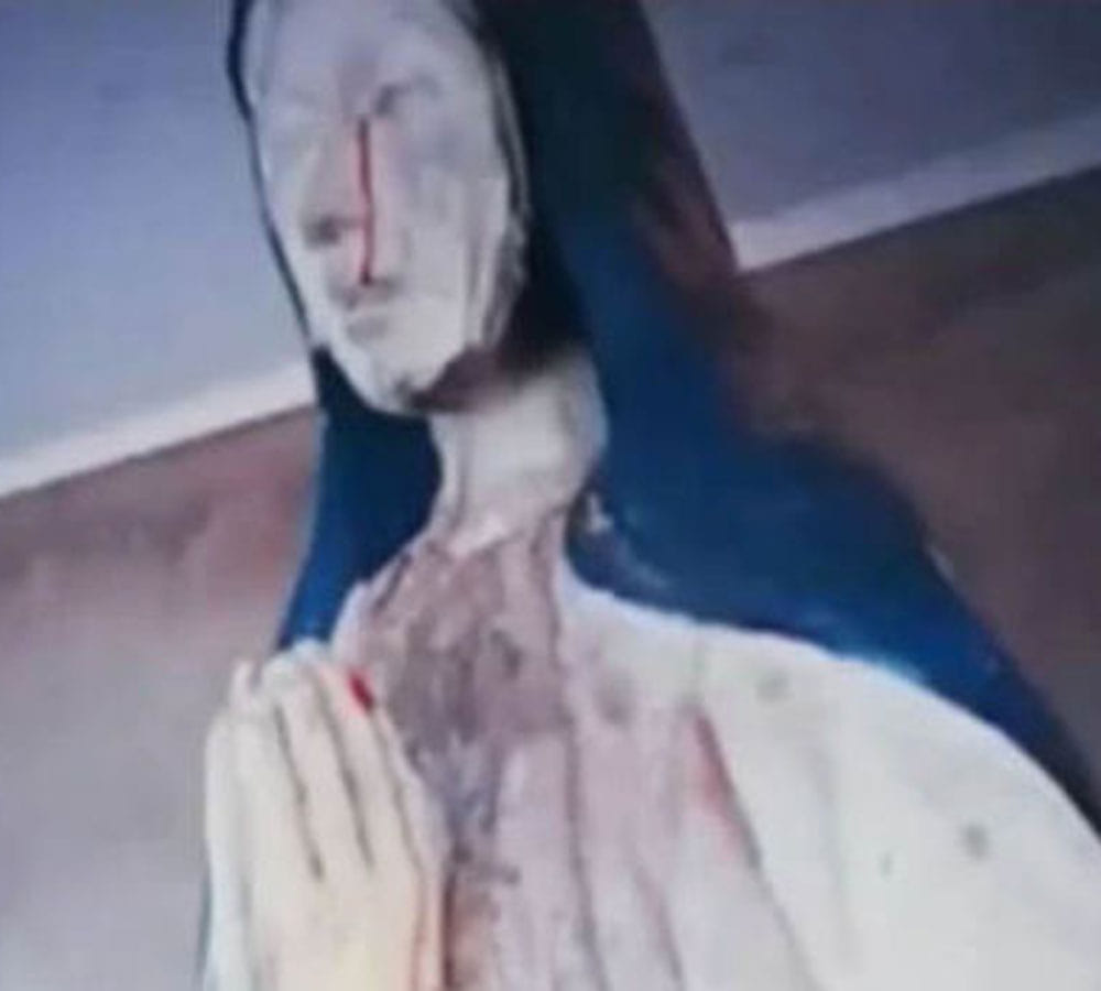 Virgin Mary statue starts crying blood
