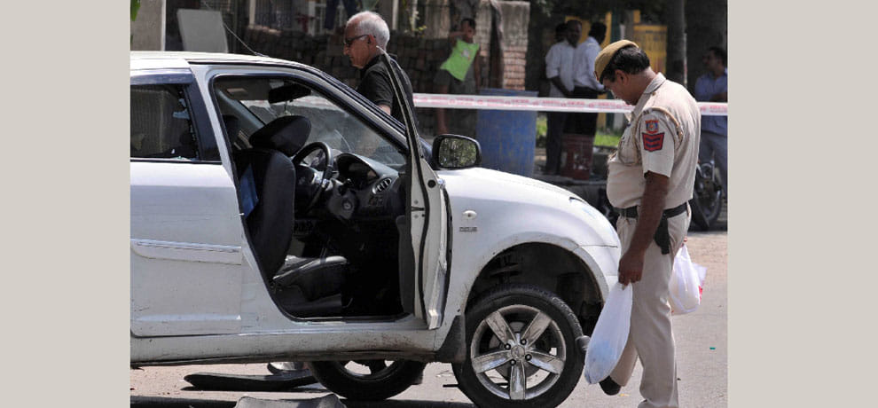 Crooks sat in the car wearing a helmet, it was a massive encounter in filmy style