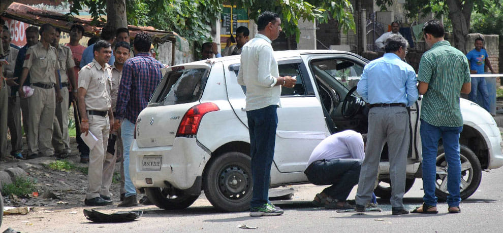 Crooks sat in the car wearing a helmet, it was a massive encounter in filmy style