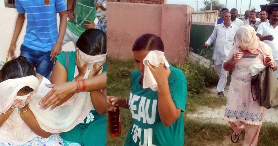 mother daughter reached with wine bottle and alive cock in cemetery for black magic
