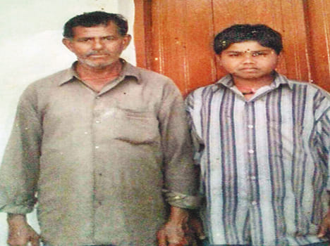 Four months later, his father and brother's photographs found