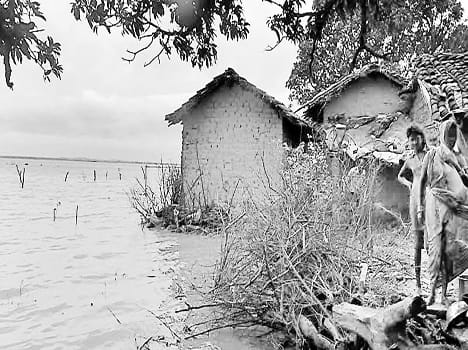 Rain fell on the thatched houses as spam