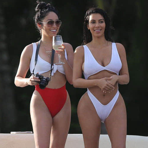 kim kardashian enjoying with her daughter in a swimming pool