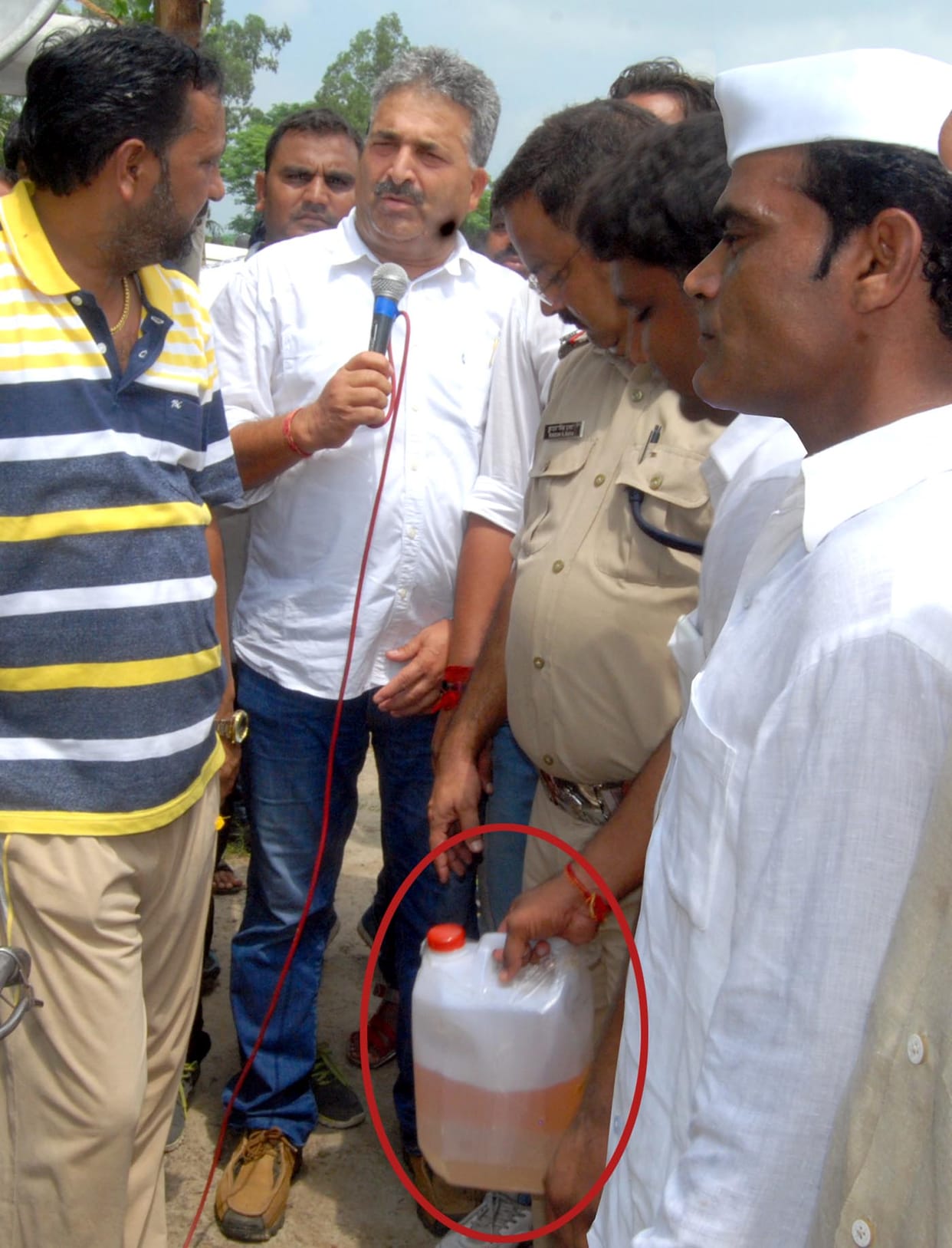 The self-immolation with petrol cans warning