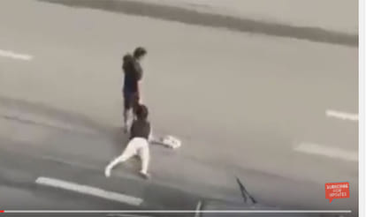 video shows woman dragged by HAIR across road in china
