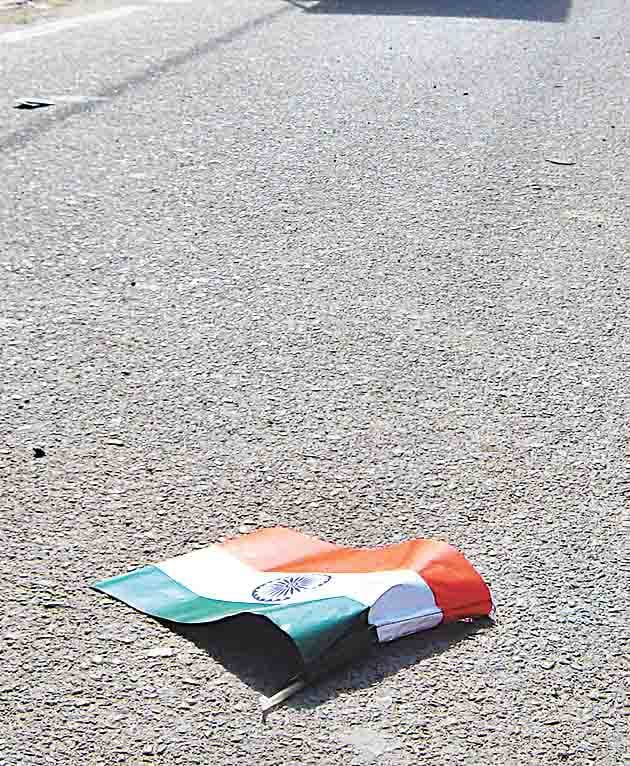 flag fell down on road