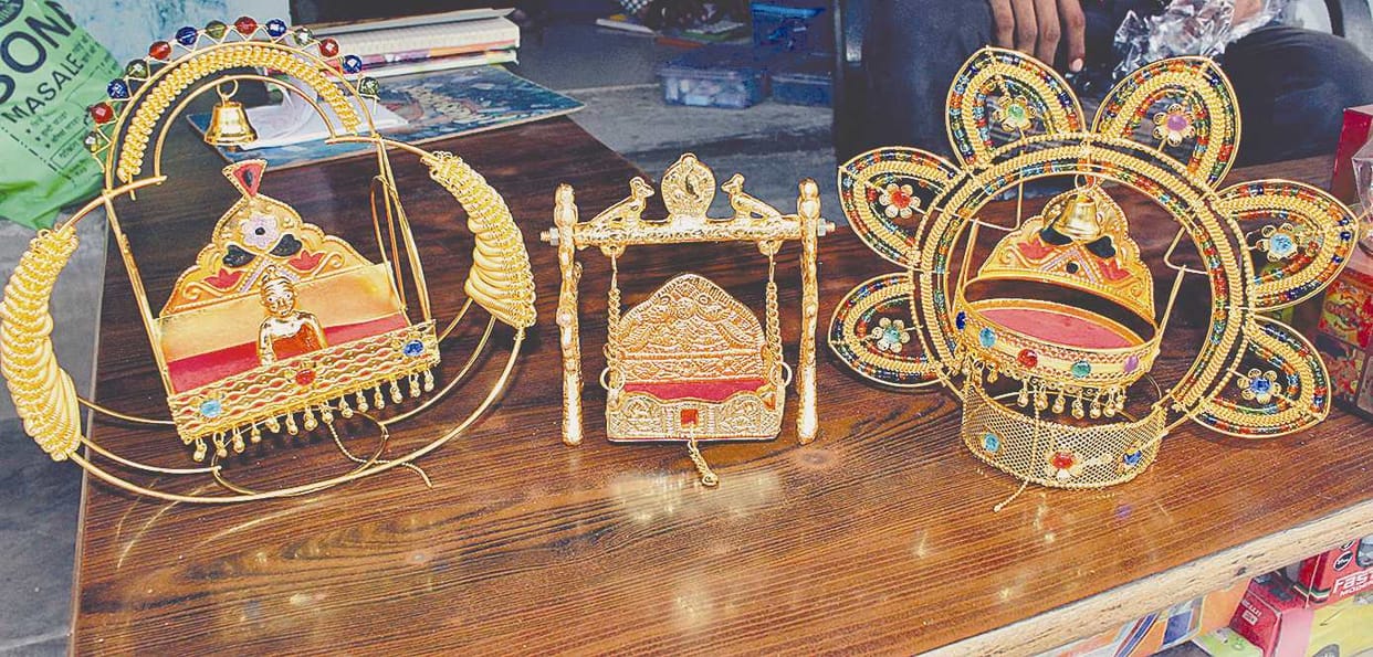 Dressed clay toys in the market for Janmashtami