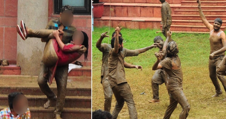 boys girls students of central university playing in mud for janamashtmi celebration