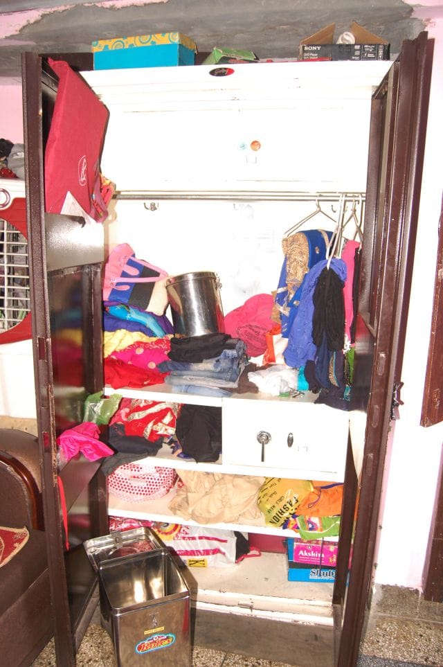 Dry cleaner and a half lakh stolen from house